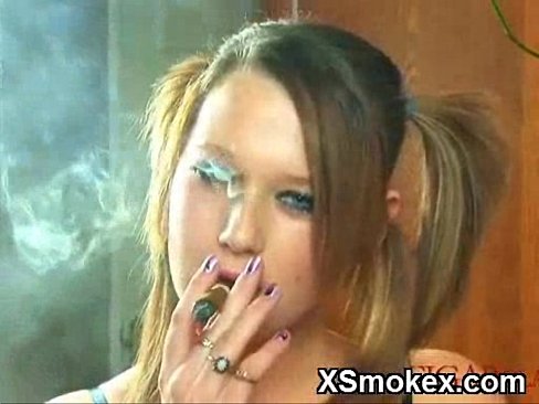 Slutty teen smoking cigarette topless