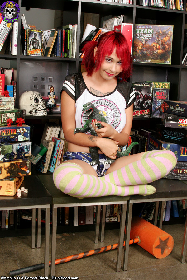 Nerdy redhead gamer girl gets