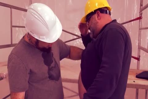 Construction worker enjoys stroking cock