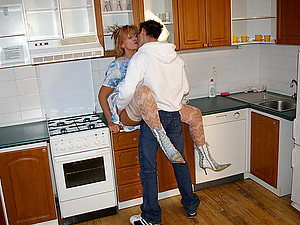 Kitchen with horny housewife