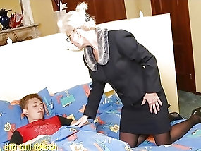 Mature woman fucks her son