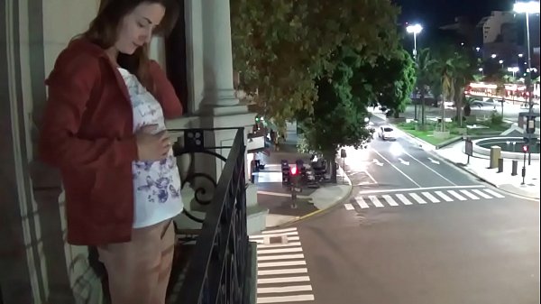 Outdoor public pissing from balcony